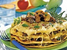 
	Zapékané omelety s houbami.
